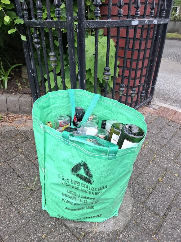 Bottle bank alternative in Ireland: a filled GlassBag waiting at the doorstep for collection.