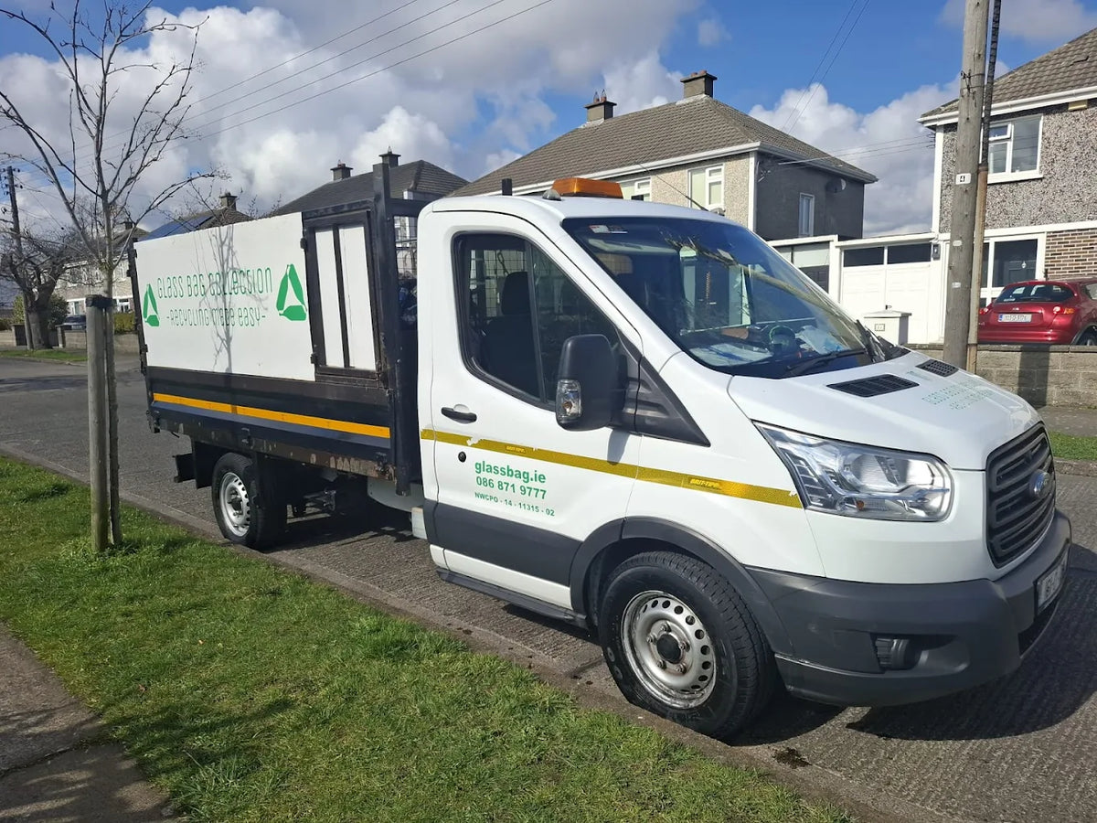 GlassBag collection truck on a Dublin street collecting household glass from doorsteps.