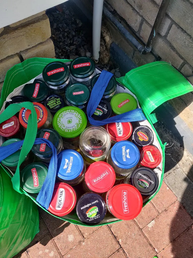 Glass jars rinsed and ready for GlassBag doorstep collection, the container glass we accept.