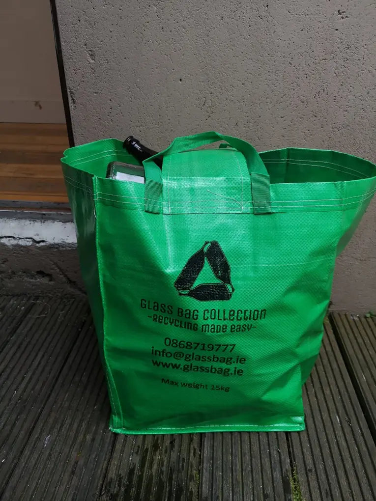 One branded GlassBag full of bottles at the front door, ready for collection
